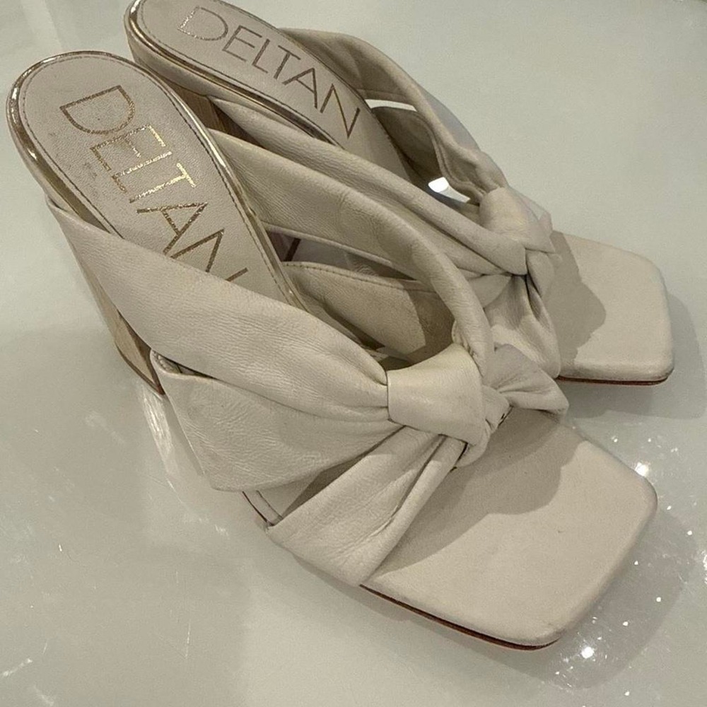 Deltan white leather wedge sandals with bow detail